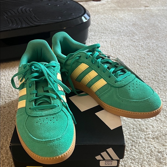 adidas Shoes - Adidas Emerald Sneakers with yellow Stripes